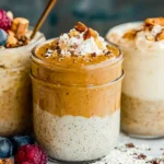 Blended overnight oats in a jar with berries and honey