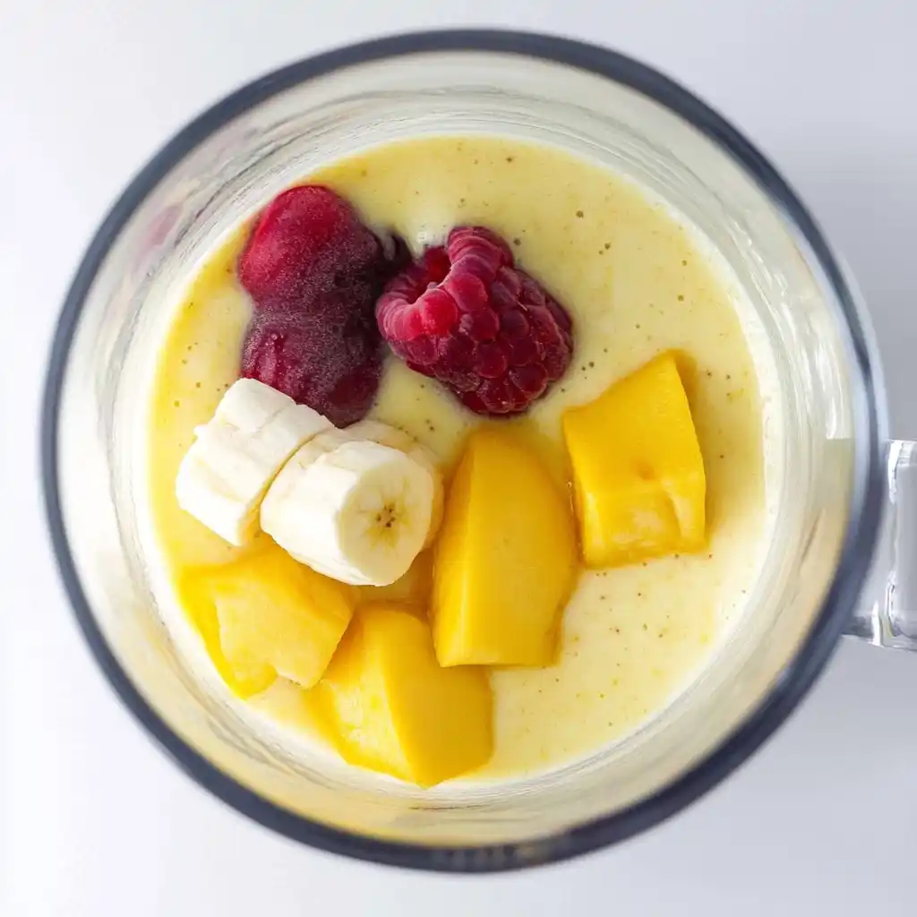 tropical smoothie ingredients arranged